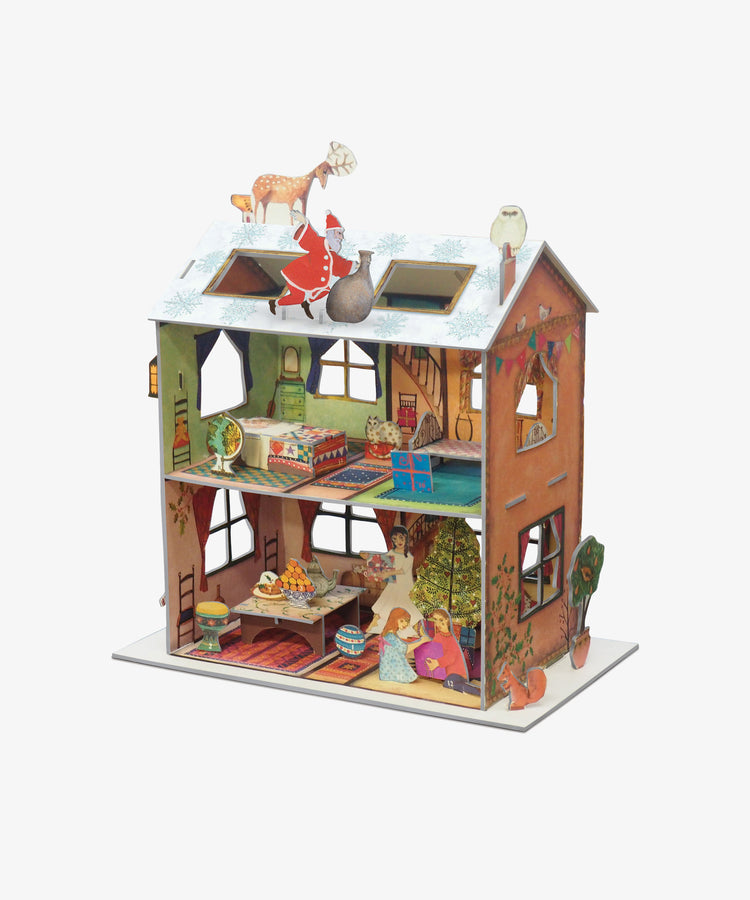 The Night Before Christmas Advent Calendar is a colorful two-floor dollhouse diorama, decorated for the holidays with Santa and a reindeer on the snowy roof, and festive rooms inside featuring figures, gifts, and a holiday table.