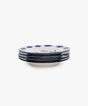 A set of four Catalina Small Plates, crafted from Portuguese ceramic, features blue hand-painted floral patterns and rims. Each plate showcases timeless craftsmanship and elegant design, displayed against a plain white background.