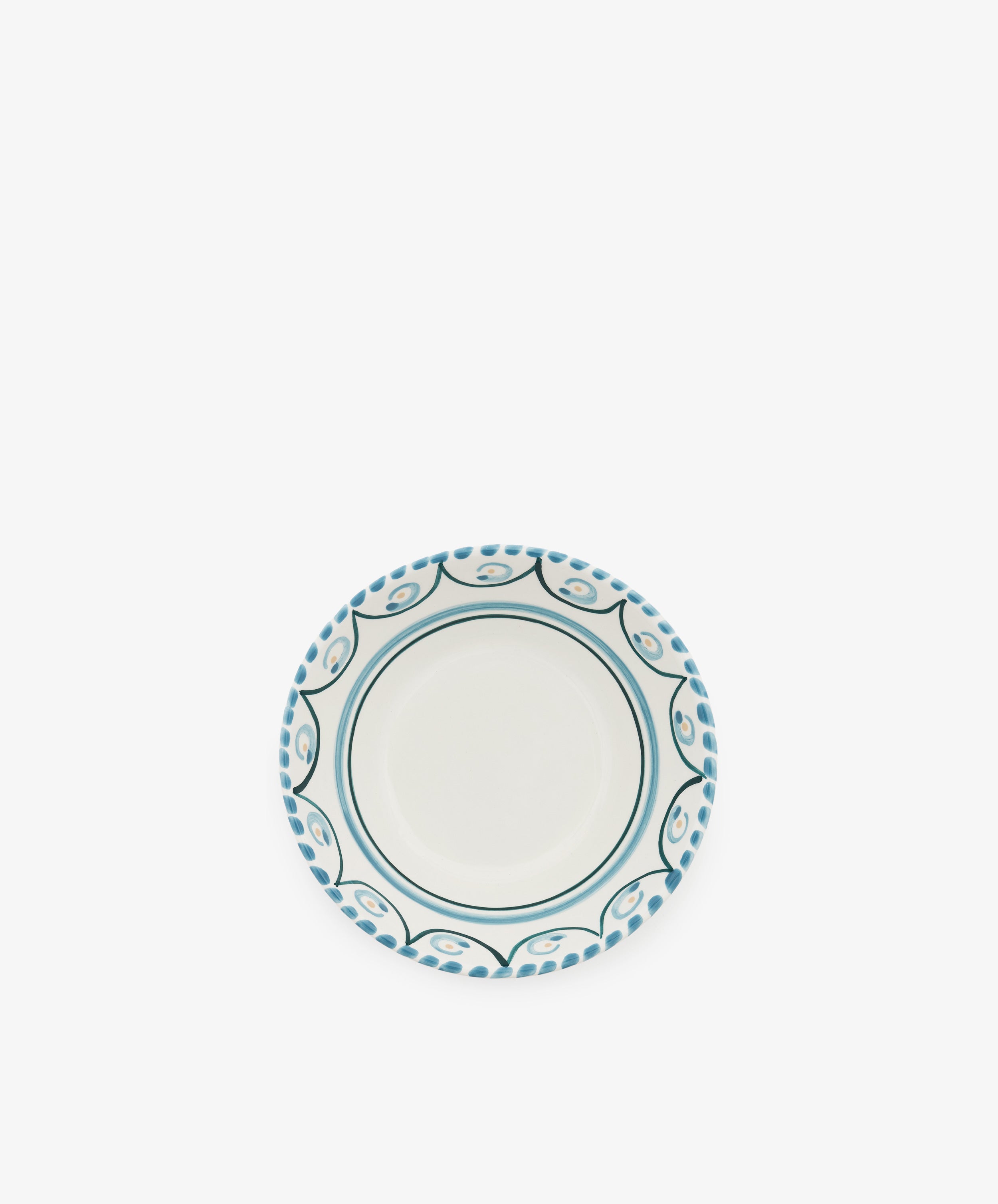 The Ottoline Cereal Bowl, Set of 4, features a round ceramic design with a white center and blue patterned border, displayed on a plain white background.