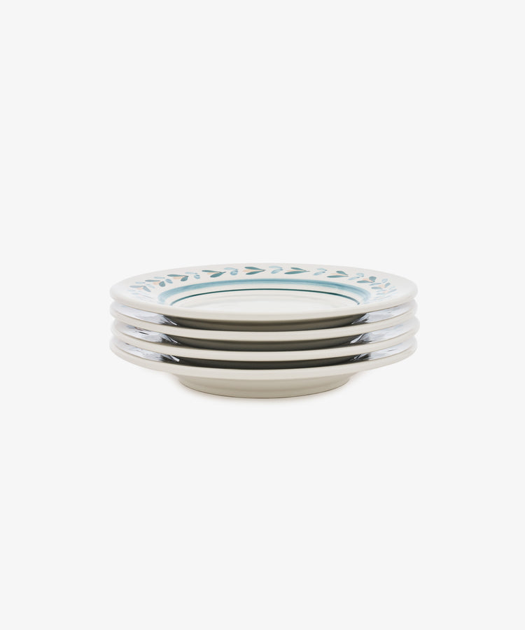 The Ottoline Small Plate, Set of 4, features white ceramic plates with a blue leaf pattern around the rim, displayed on a plain white background.