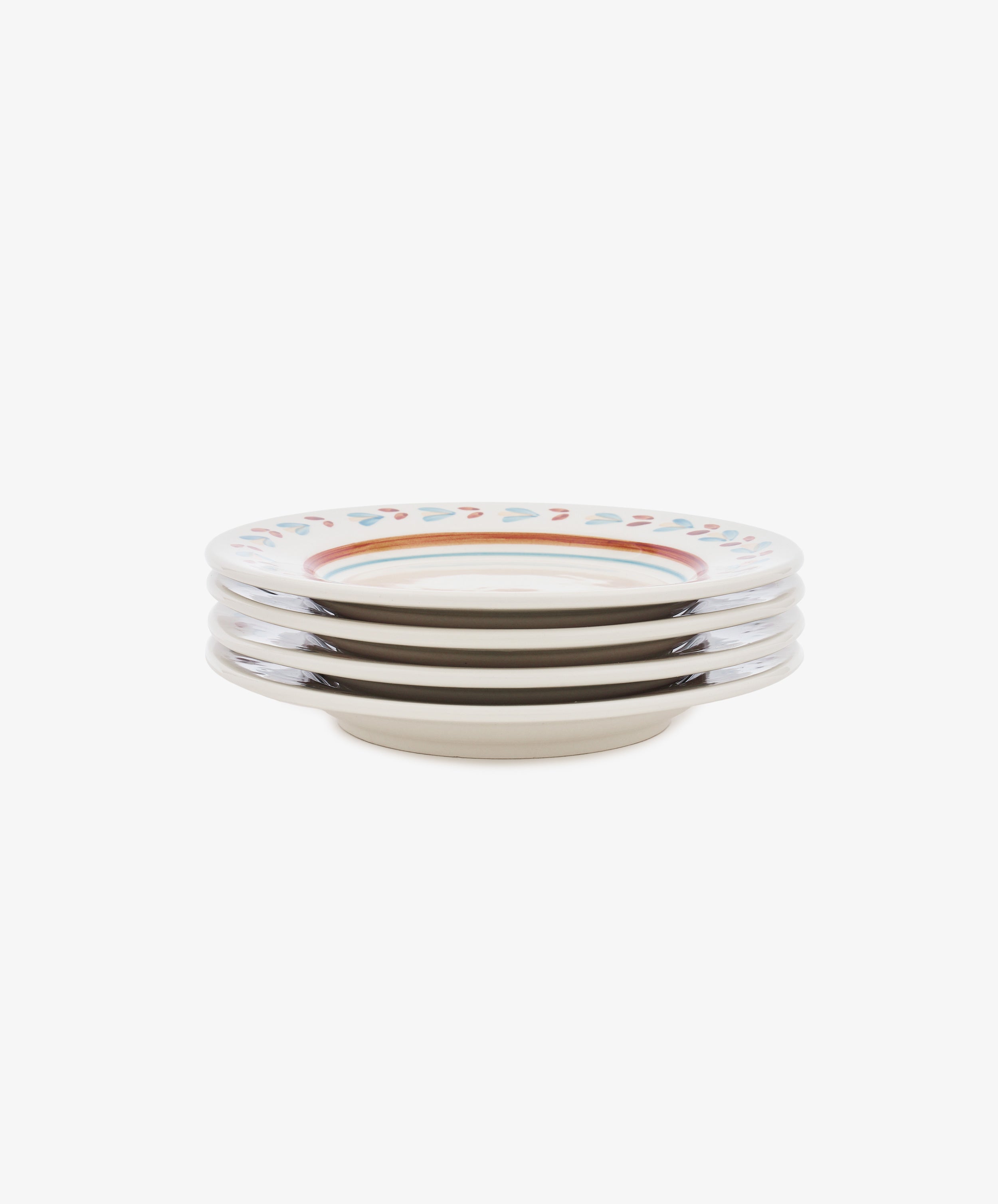 The Ottoline Small Plate, Set of 4, features four ceramic plates with a blue and red patterned rim on a white background, inspired by Tess Newall's hand-painted designs.