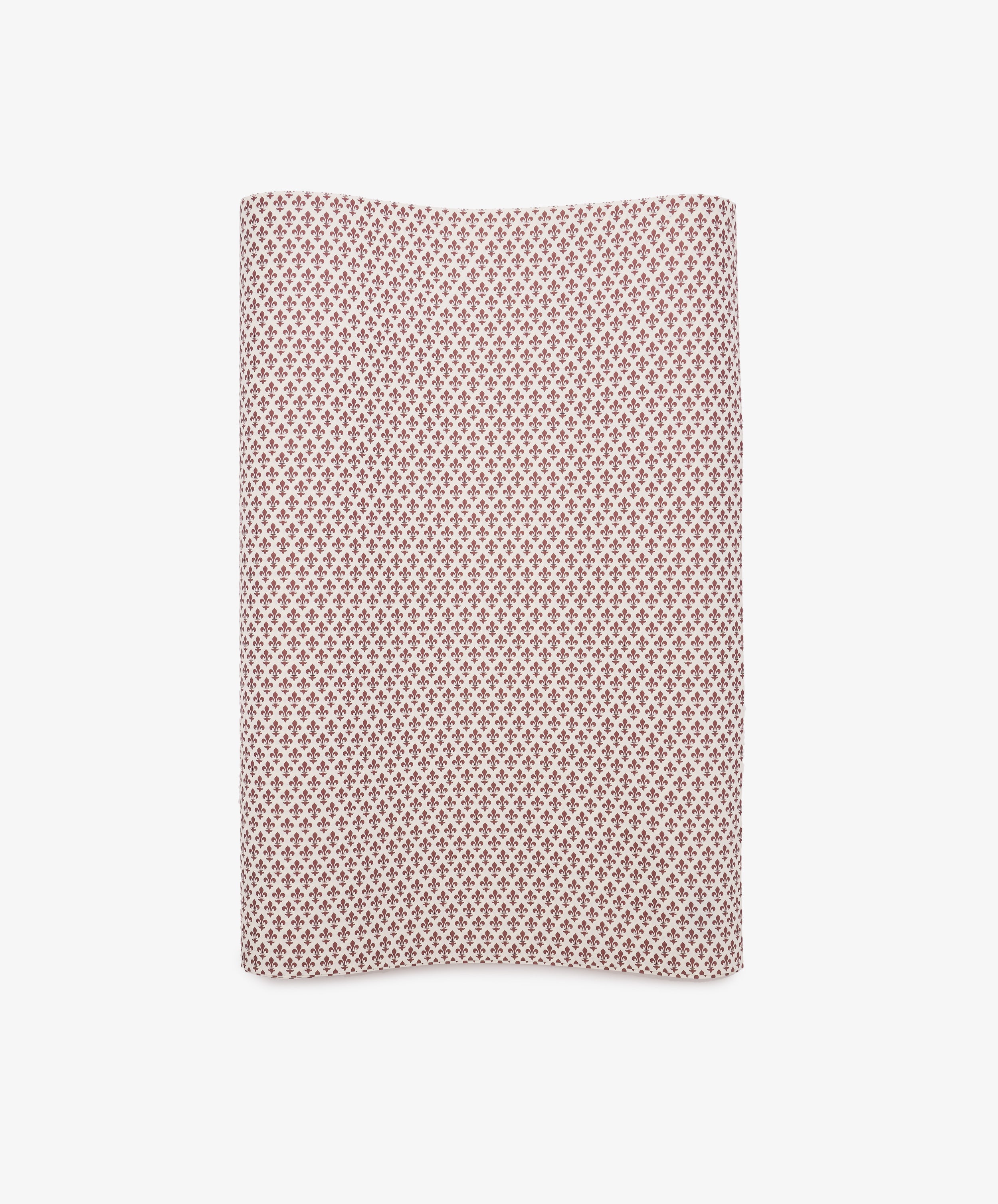 Lilies Gift Wrap—rectangular sheet featuring a small red geometric pattern on a white background—displayed against a plain white surface.
