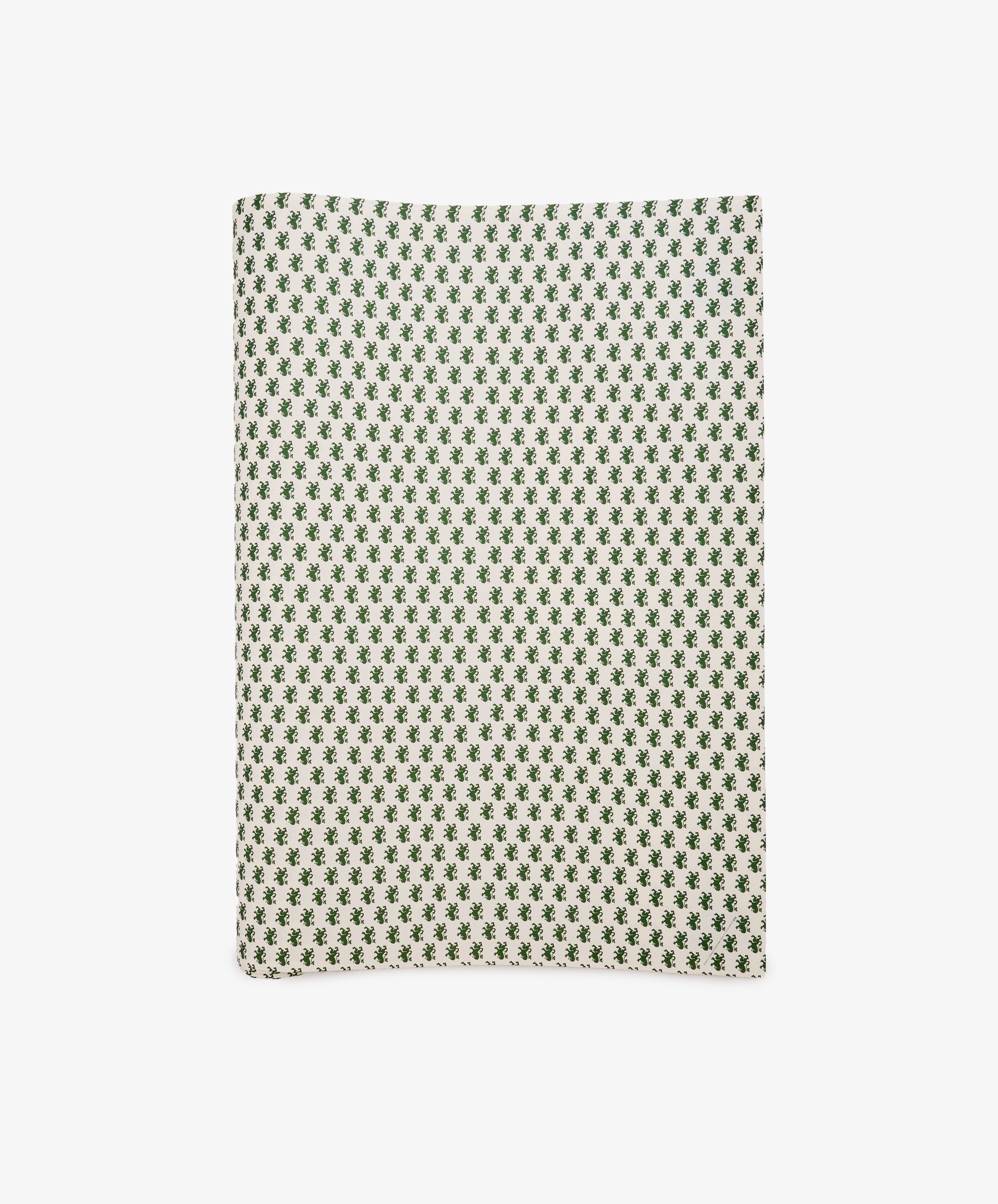 A sheet of Rampant Lions Gift Wrap featuring a repeating small green geometric floral pattern on a cream background is shown folded and displayed flat on a white surface.