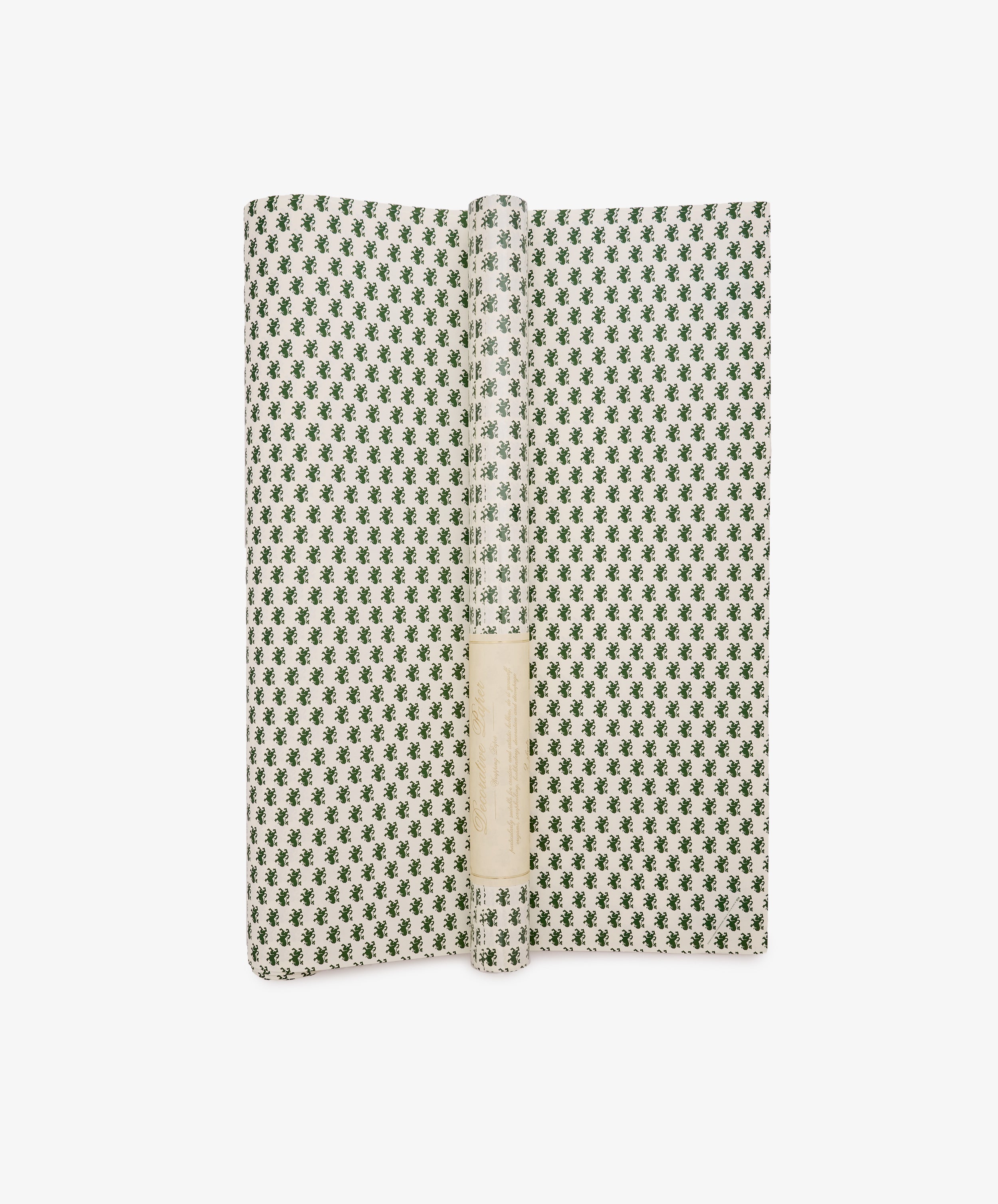 An open book featuring the “Rampant Lions Gift Wrap”—a green and white patterned cover reminiscent of elegant wrapping paper—with a blank white label on the spine, photographed against a white background.