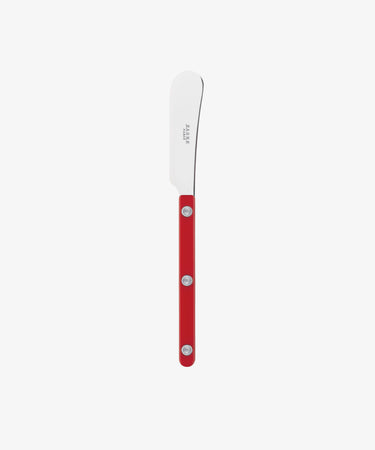 The Butter Knife has a rounded stainless steel blade and a red handle with three metal rivets, displayed on a plain white background. Perfect as an everyday butter spreader.