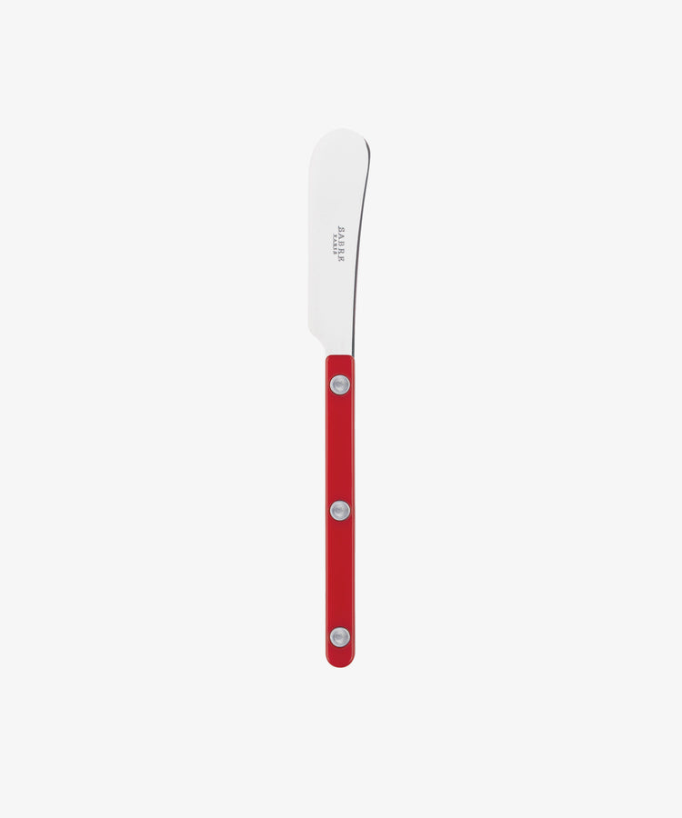 The Butter Knife has a rounded stainless steel blade and a red handle with three metal rivets, displayed on a plain white background. Perfect as an everyday butter spreader.