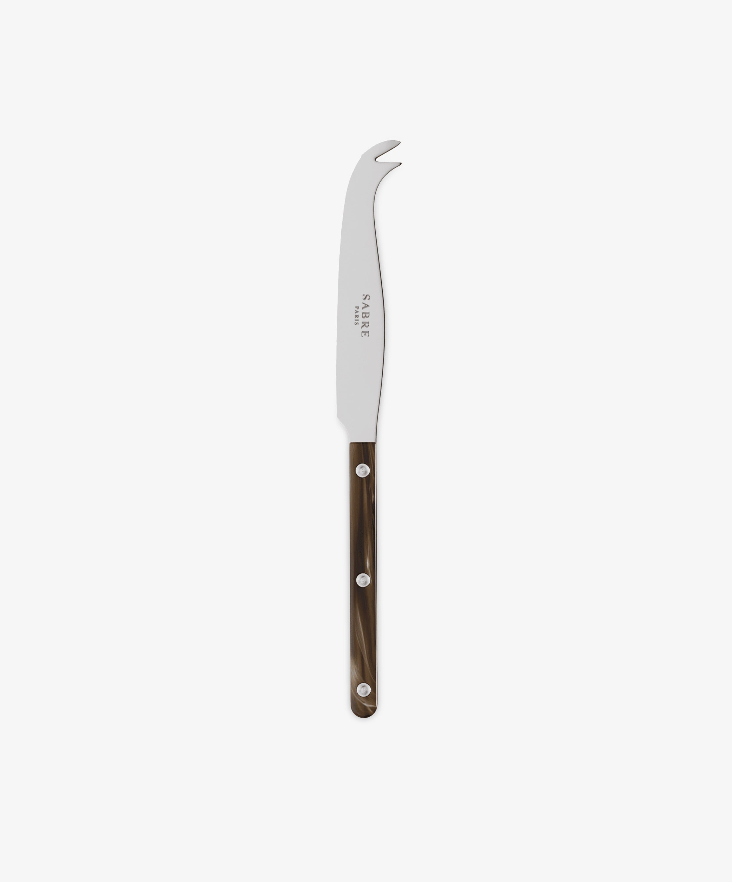 The Large Cheese Knife, inspired by French bistrot cutlery, has a curved stainless steel blade, forked tip, and a dark brown handle with three metal rivets, displayed on a white background.