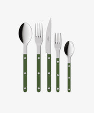 The Bistrot 5 Piece Cutlery Set features a tablespoon, dinner fork, knife, salad fork, and teaspoon with green handles and metal rivets, echoing classic French café style. They are arranged side by side on a white background.