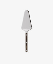 The Tart Server from the Sabre bistrot cutlery set features a triangular metal blade and dark handle, shown against a plain white background—an elegant and stylish addition to your kitchen utensils collection.