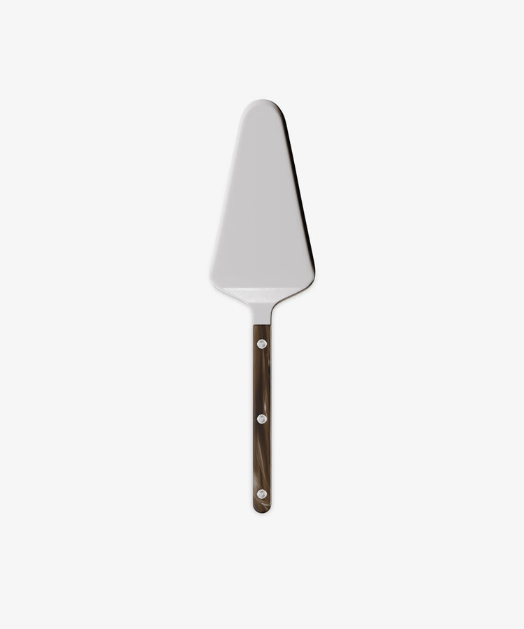 The Tart Server from the Sabre bistrot cutlery set features a triangular metal blade and dark handle, shown against a plain white background—an elegant and stylish addition to your kitchen utensils collection.