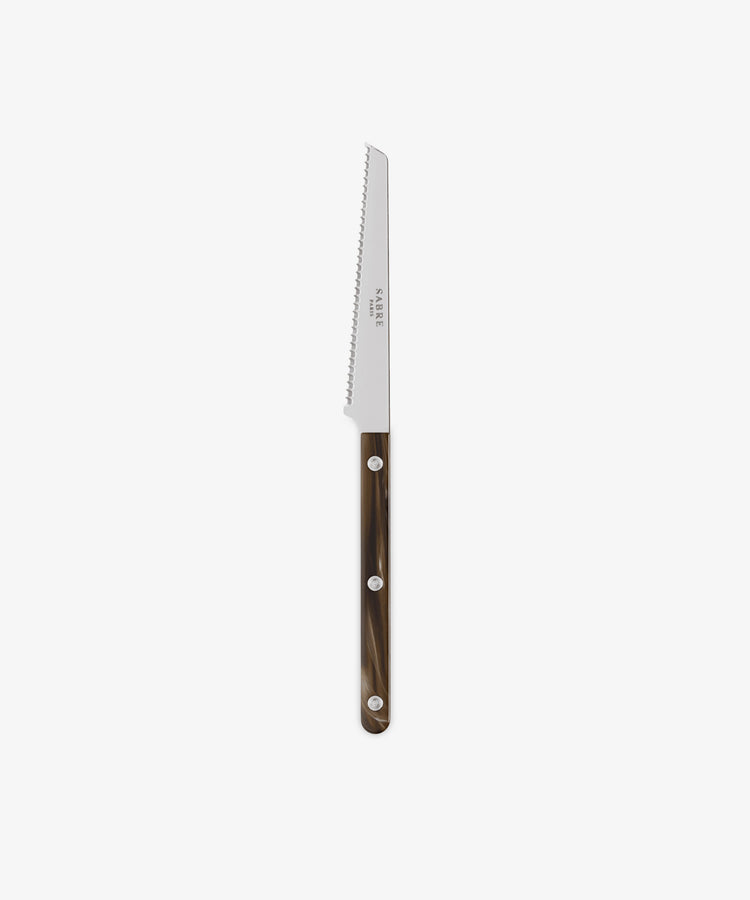 A Tomato Knife with a brown handle and three rivets, displayed on a white background—an elegant addition to your kitchen utensils collection.