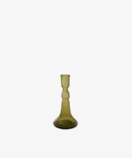 The Lucia candleholder, made of olive glass with a bulbous base and narrow neck, is centered against a plain white background—ideal for enhancing any table setting.
