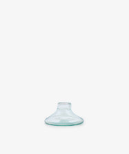 The Lucien candleholder, Small, features clear recycled glass with a wide flat base and short narrow neck, shown centered on a plain white background.