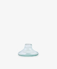 The Lucien candleholder, Large—a clear, flat-bottomed glass piece with a wide base and short neck, handblown in Morocco from recycled glass—is centered on a plain white background.
