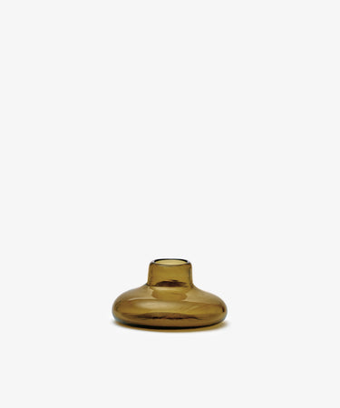 The Lucien bubble candleholder, Large, is a handblown, round amber glass piece with a short neck, crafted in Morocco and photographed against a plain white background.