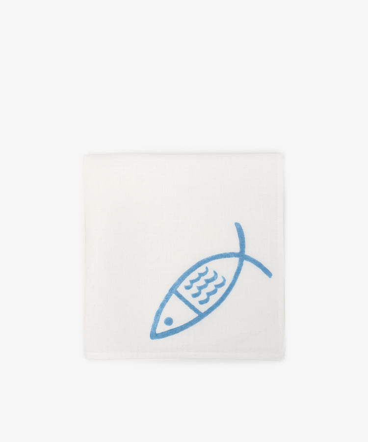 Set of 6 Pezza Napkins in white linen, each featuring a hand block-printed blue fish illustration in one corner, shown on a plain background.
