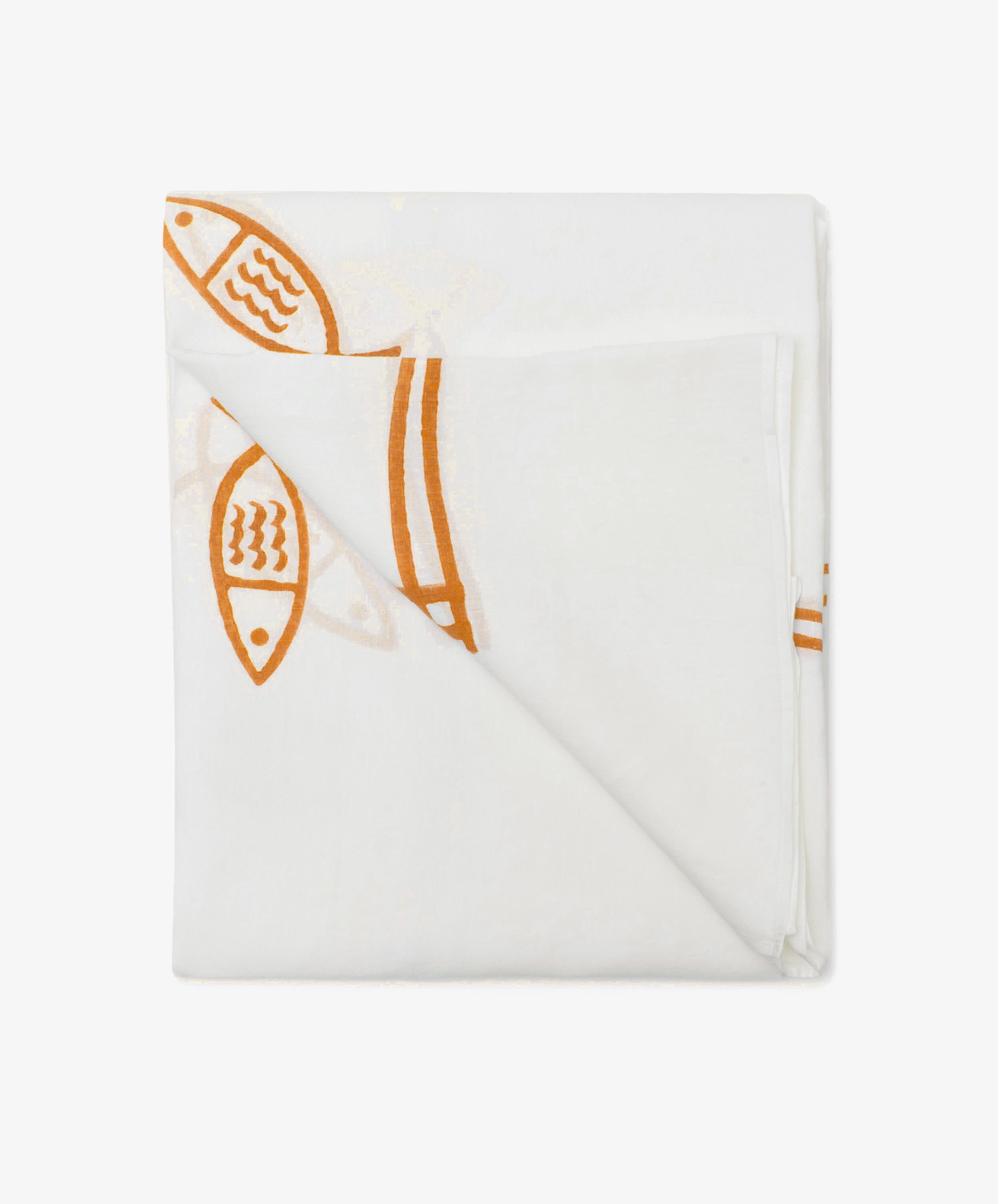 The Pezza Tablecloth is a folded white linen tablecloth with a partially visible orange fish pattern, ideal for bringing a touch of coastal dÃ©cor to your space.