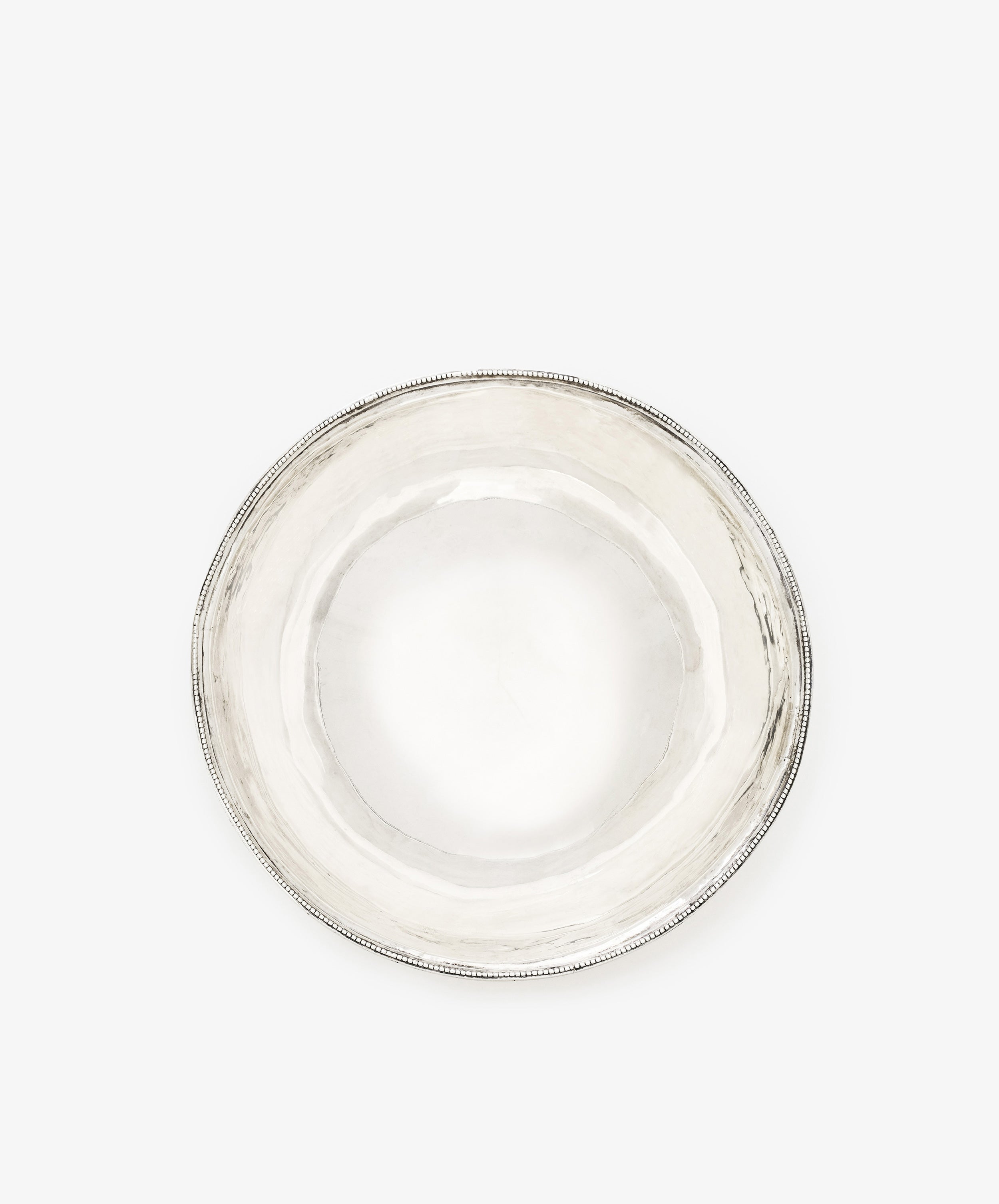 A Vintage Silver Bowl with a round shape, antique finish, subtly textured surface, and simple beaded rim, shown from above on a white background.