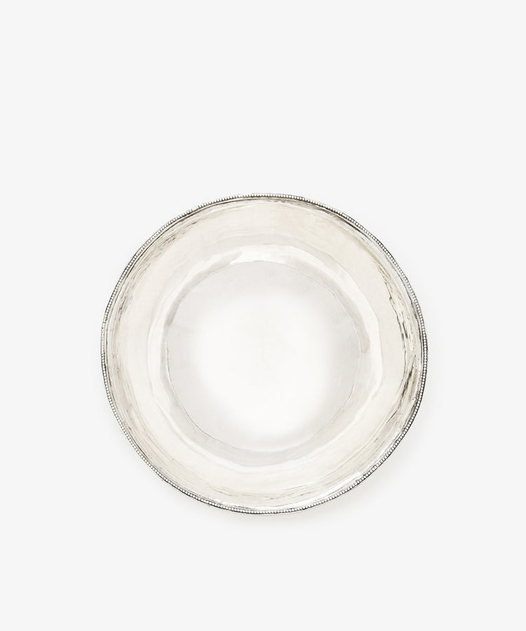 A Vintage Silver Bowl with a round shape, antique finish, subtly textured surface, and simple beaded rim, shown from above on a white background.