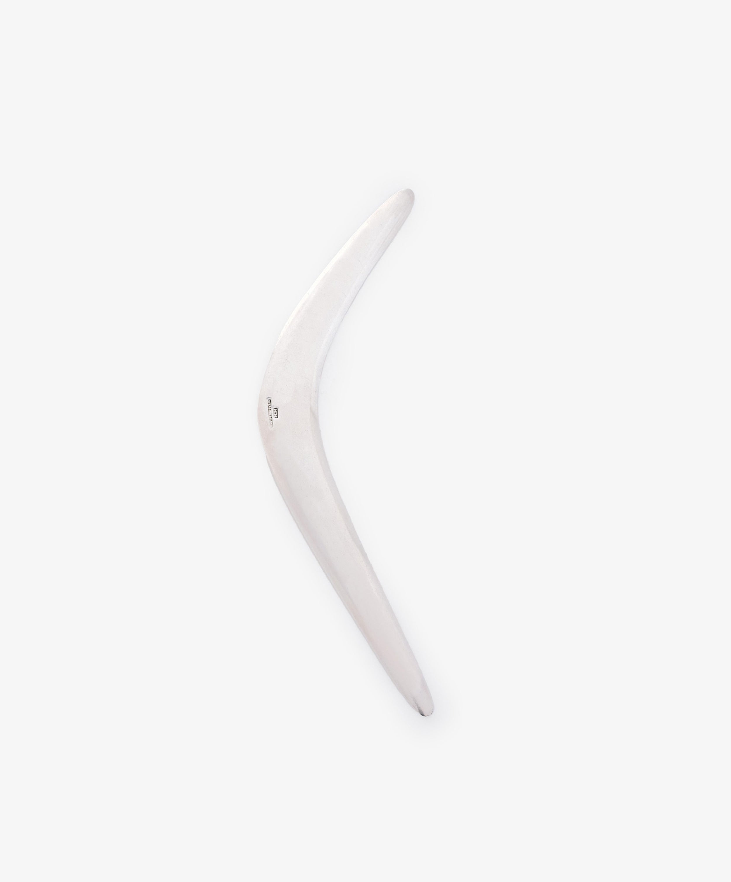 The Vintage Silver Boomerang Letter Opener, with its smooth surface and sleek design, is displayed against a plain light gray background—perfect as a modern desk accessory.
