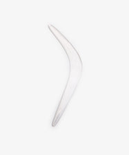 A Vintage Australian Boomerang Letter Opener, white and curved, is displayed on a plain white background, capturing the elegance of minimalist desk accessories.