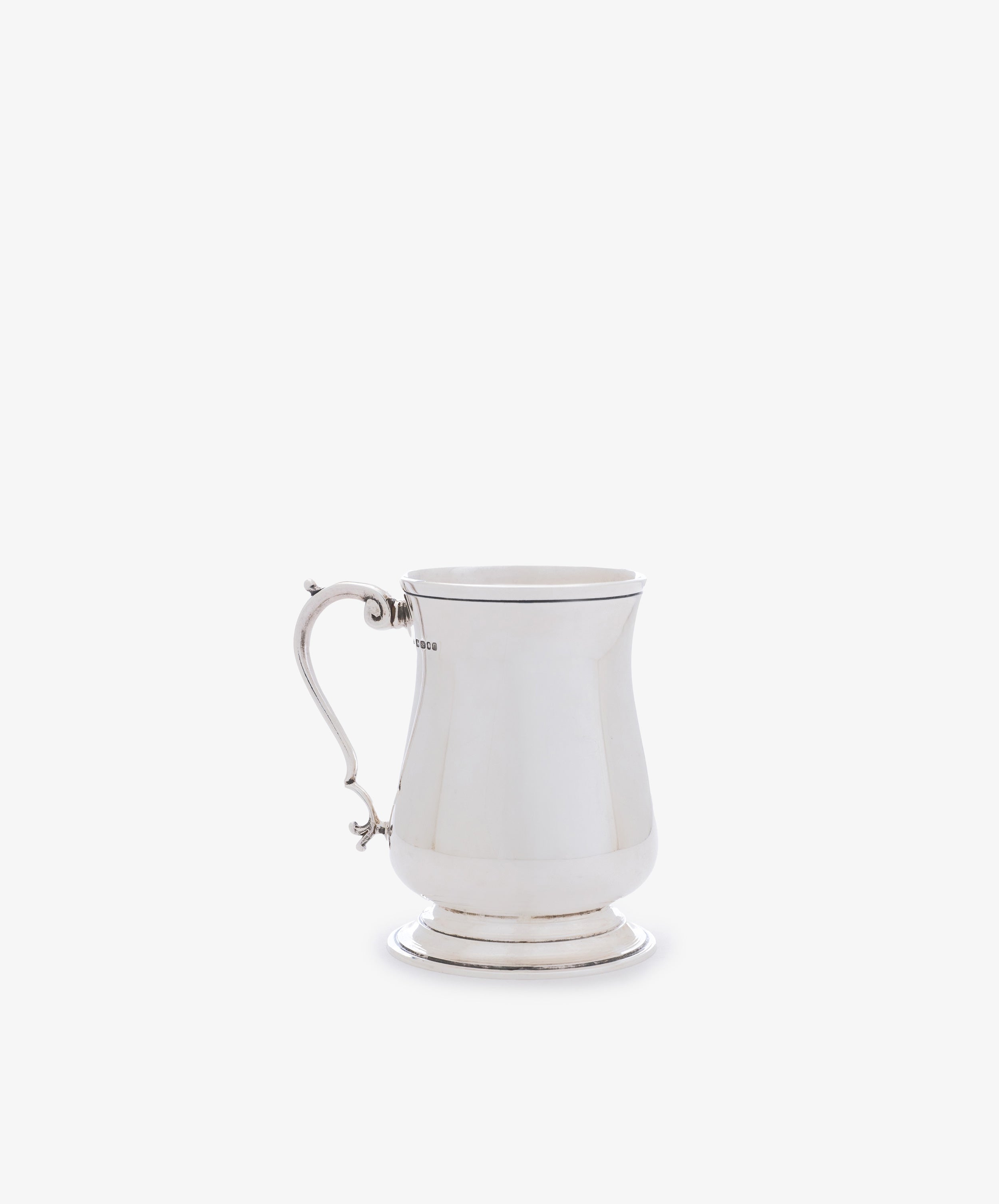 A Vintage English Silver Child's Mug featuring a curved handle and flared base is displayed against a white background—an elegant and timeless gift for babies.