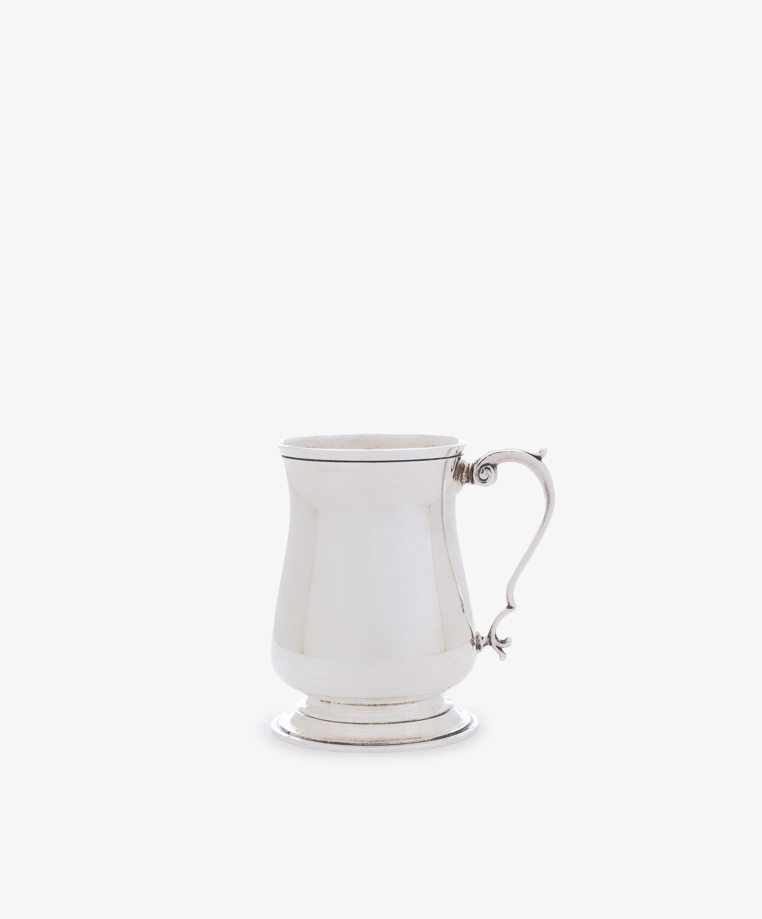 The Vintage English Silver Child's Mug features a polished finish, curved handle, flared base, and gently tapered body, shown against a plain white background.