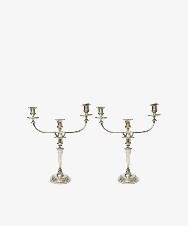 A set of 2 Vintage Silver-Plated Sheffield Plate Candelabra, each with a central stem and two curved arms in classic Georgian style, displayed on a plain white background.