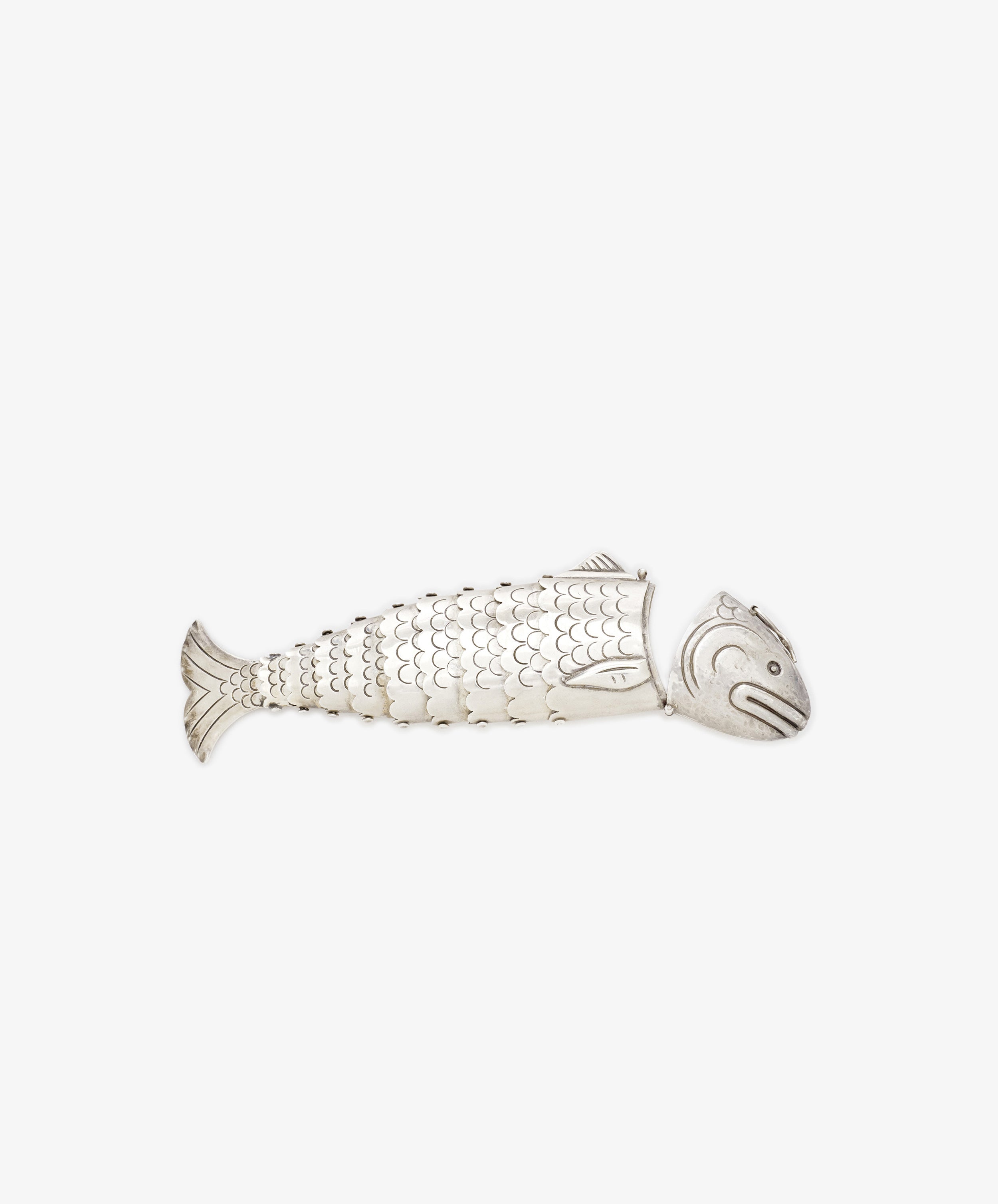 The Vintage Silver Articulating Fish, featuring detailed scales and fins, is shown against a plain white background.