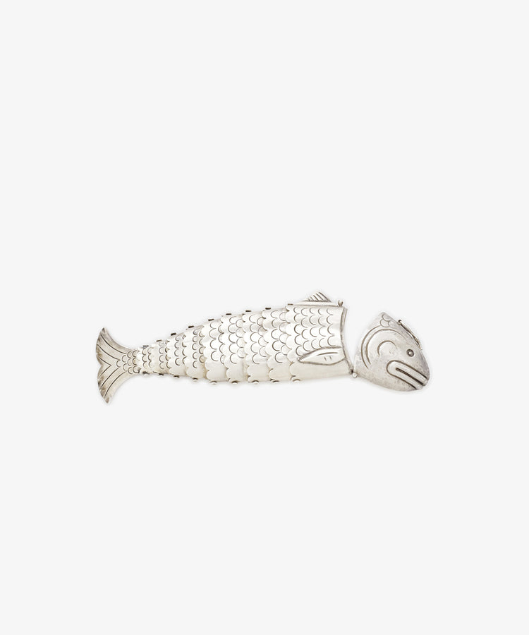 The Vintage Silver Articulating Fish, featuring detailed scales and fins, is shown against a plain white background.