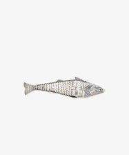 The Vintage Silver Articulating Fish charm features detailed scales and movable segments, resembling a lucky talisman, beautifully displayed on a plain white background.