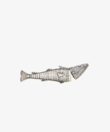 Vintage Silver Articulating Fish pendant with segment joints, detailed scales, and engraved patterns—a unique talisman or lucky charm shown on a plain white background.
