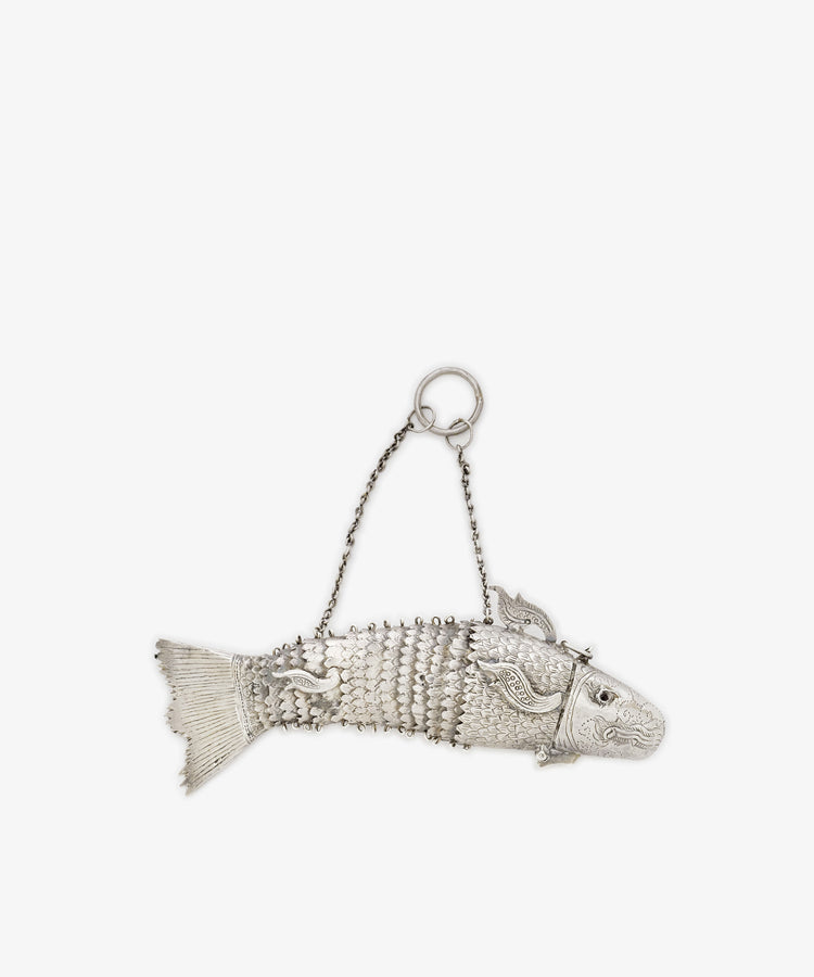 The Vintage Silver Articulating Fish is a detailed silver fish container with an articulated charm design, hinged tail, and a chain handle—an ideal unique lucky talisman.