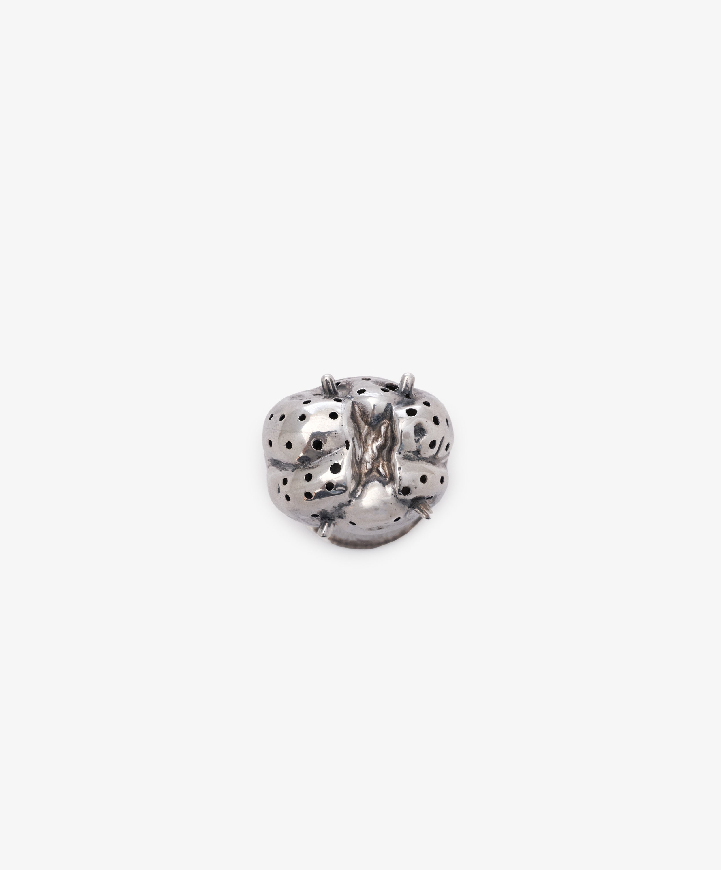 The Vintage English Silver Pepper Pot, crafted in silver and shaped like a ladybug, is displayed against a plain white background.