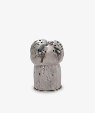 The Vintage English Silver Pepper Pot, shaped like a mushroom with small holes on top, sits against a plain white background—a charming piece of antique tableware.