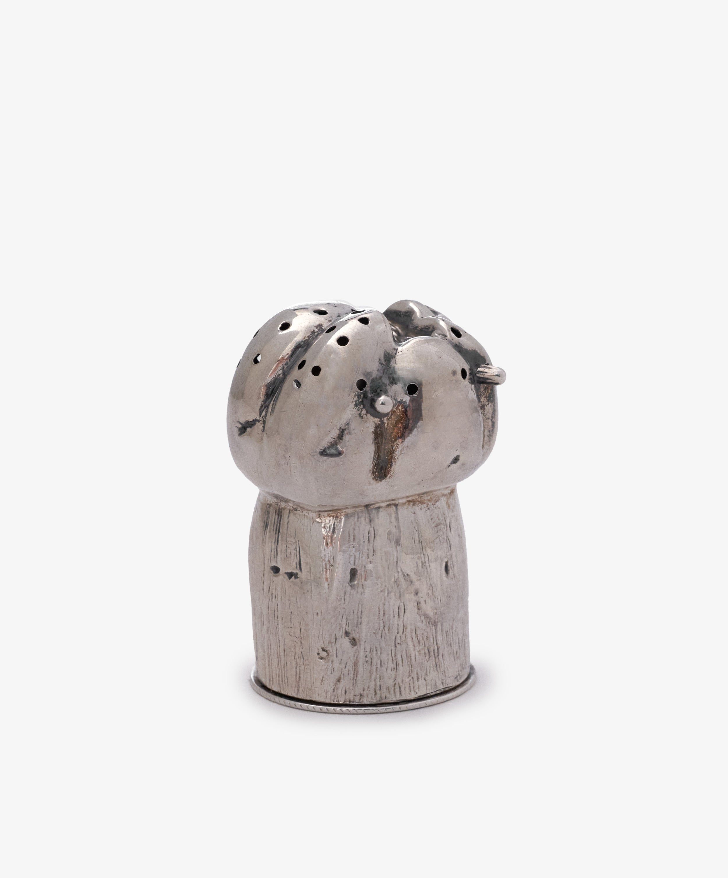 The Vintage English Silver Pepper Pot is a classic tableware piece crafted in elegant silver, featuring a traditional form and multiple holes on top—a timeless addition to your dining collection.