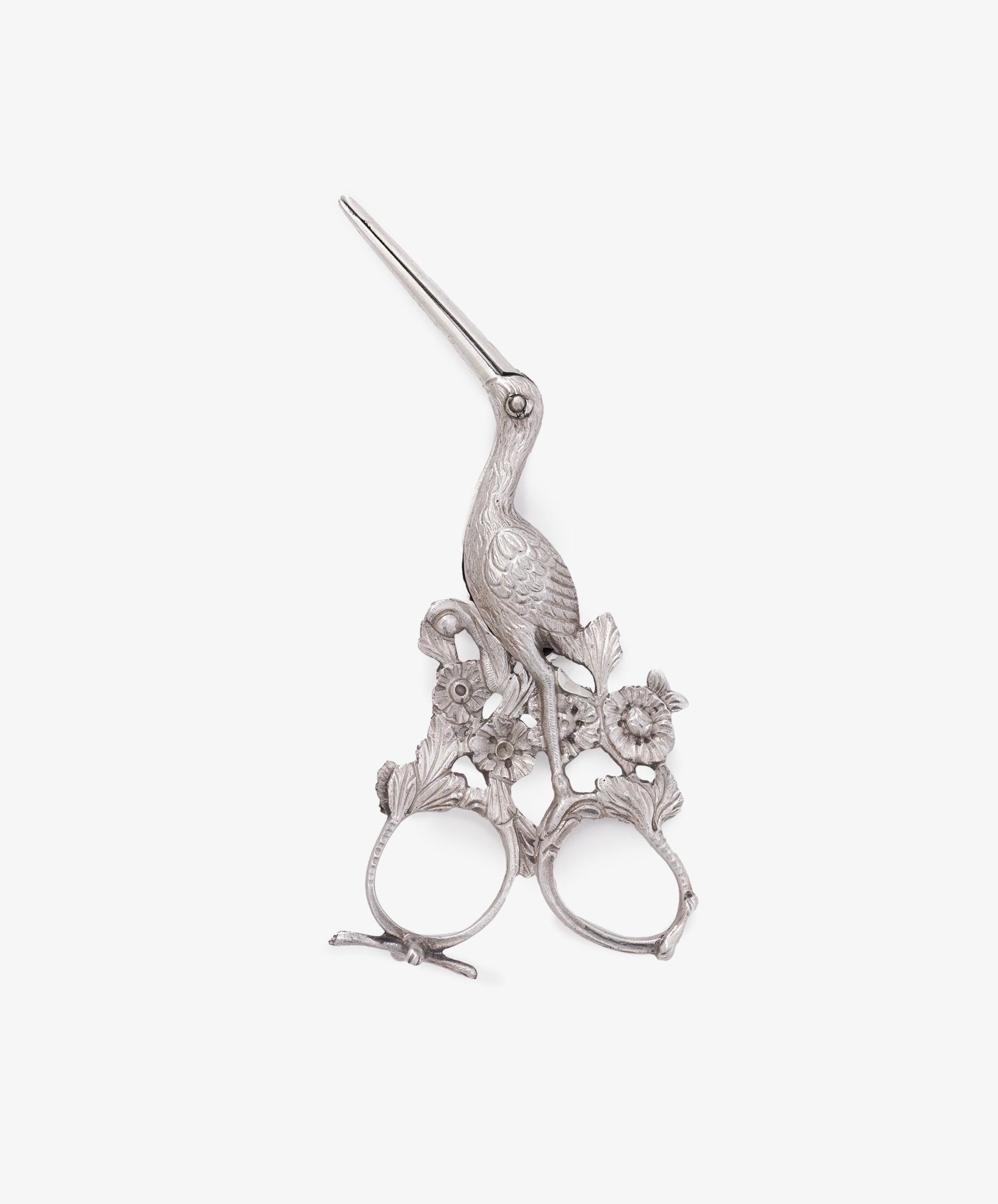 The Vintage Dutch Silver Ribbon Nips, shaped like a stork with ornate floral handle designs, evoke classic vintage sewing tools and are displayed against a white background.