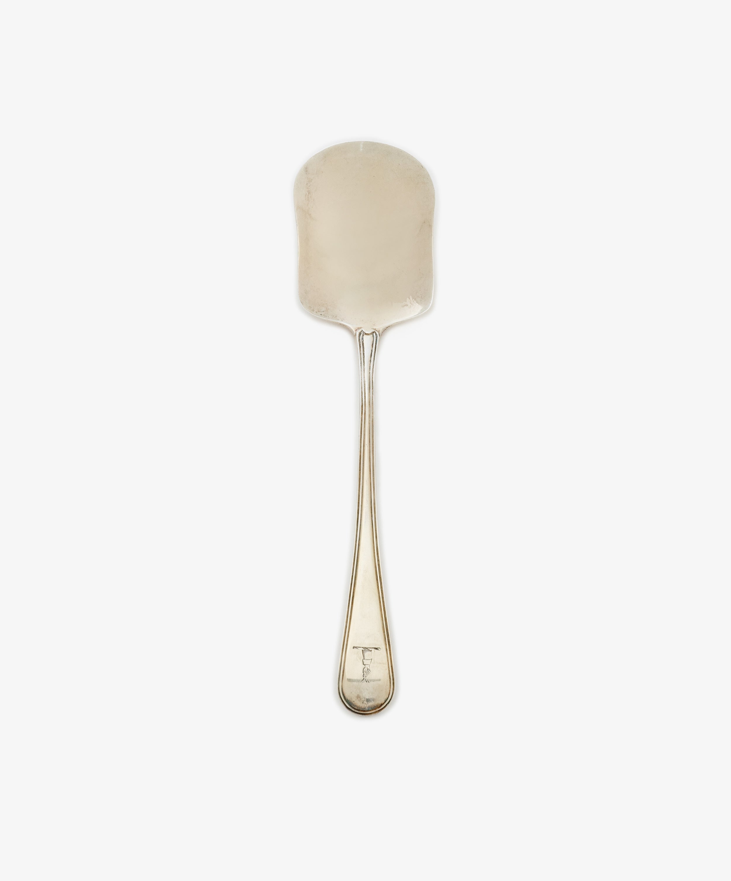 A Vintage English Silver Ice Cream Spade, dated 1798, with a wide flat rounded blade and plain handle, photographed on a white background.