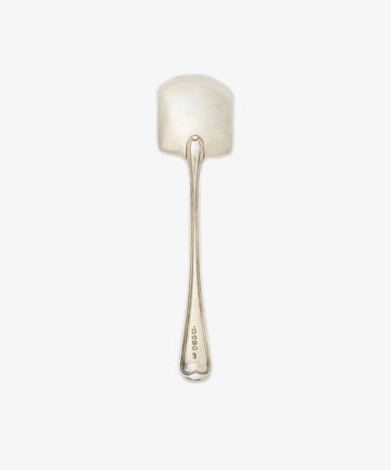 The Vintage English Silver Ice Cream Spade features a wide, flat bowl and long handle, with hallmarks near the base. Crafted in England, this elegant piece is shown on a white background.