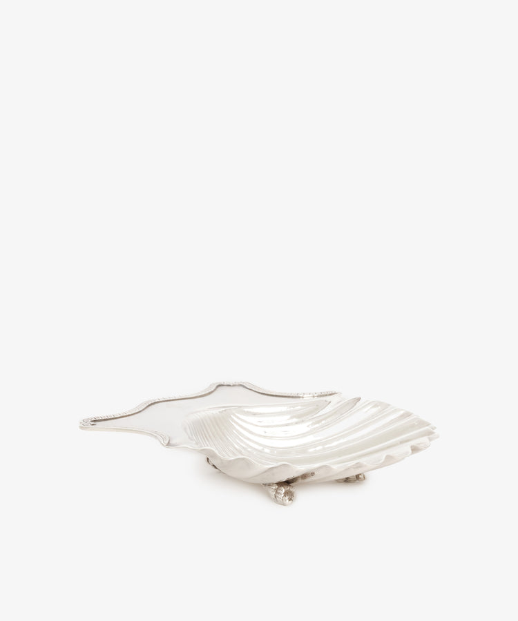 Pair of Vintage Silver Buttershells, each shaped like a seashell with ornate trim and small decorative feet, crafted by renowned Georgian London silversmith Hester Bateman, showcased on a plain white background.