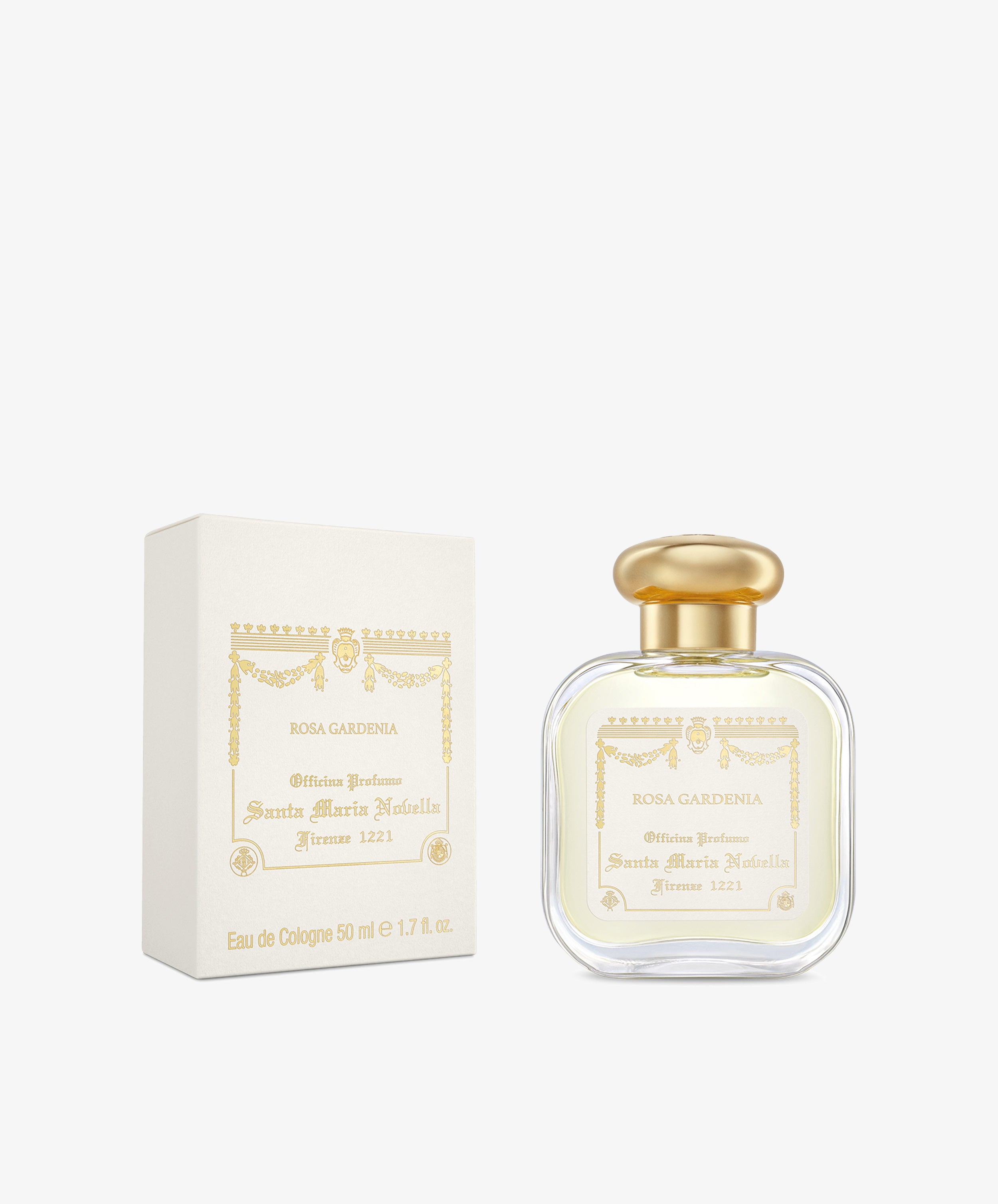 A bottle of Rosa Gardenia Eau de cologne with a gold cap is shown beside its cream-colored, gold-detailed box, highlighting this elegant floral fragrance from Santa Maria Novella.