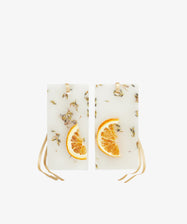 Aqua della Regina Scented Wax Tablets, Set of 2: rectangular white tablets with dried orange slices and lavender buds, each with a beige hanging ribbon, infused with Pot Pourri Cologne fragrance and shown on a plain background.