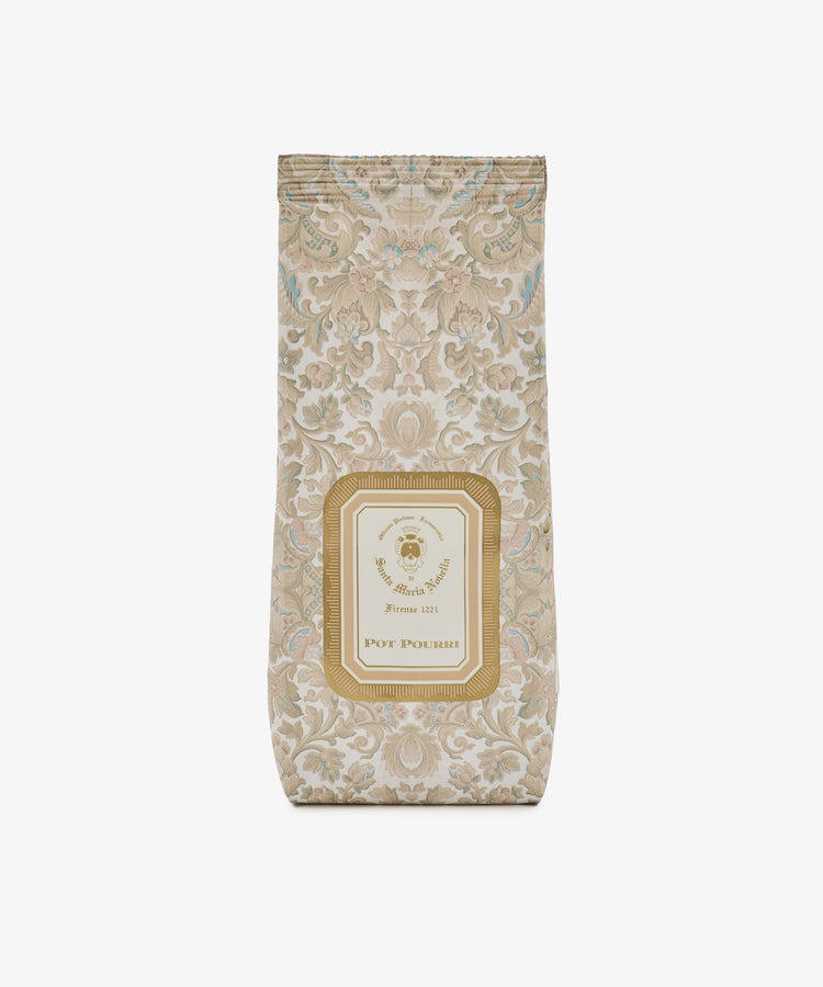 The Pot Pourri Bag is a rectangular sachet featuring ornate floral patterned packaging with a label that reads “Pot Pourri” on the front. Designed to keep your closet or linens smelling fresh, it is displayed against a white background.