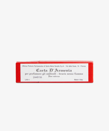 A small red box labeled Armenia Paper displays product and manufacturer info in Italian and English. It contains perfumed paper with a resinous aroma, shown against a white background.