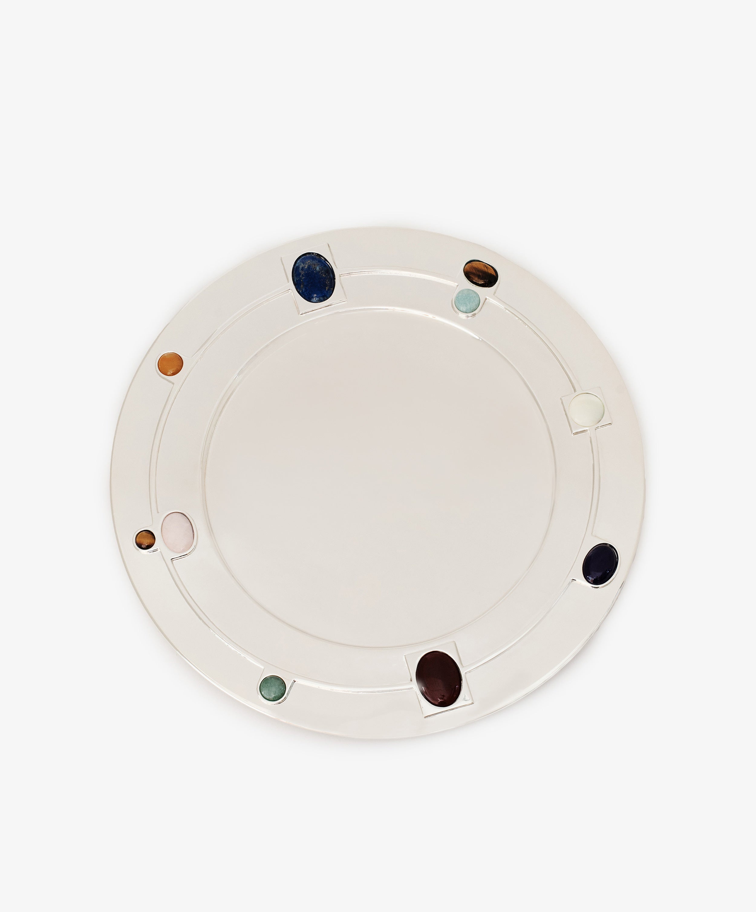 Introducing the Verola Round Tray: a white ceramic serving piece featuring evenly spaced, colorful, round stones embedded around the rim—reminiscent of an eight-stones ring. Placed on a plain white background, this eye-catching tray evokes the elegance of a silver-polished amaro holder and skillfully blends functional design with decorative charm.