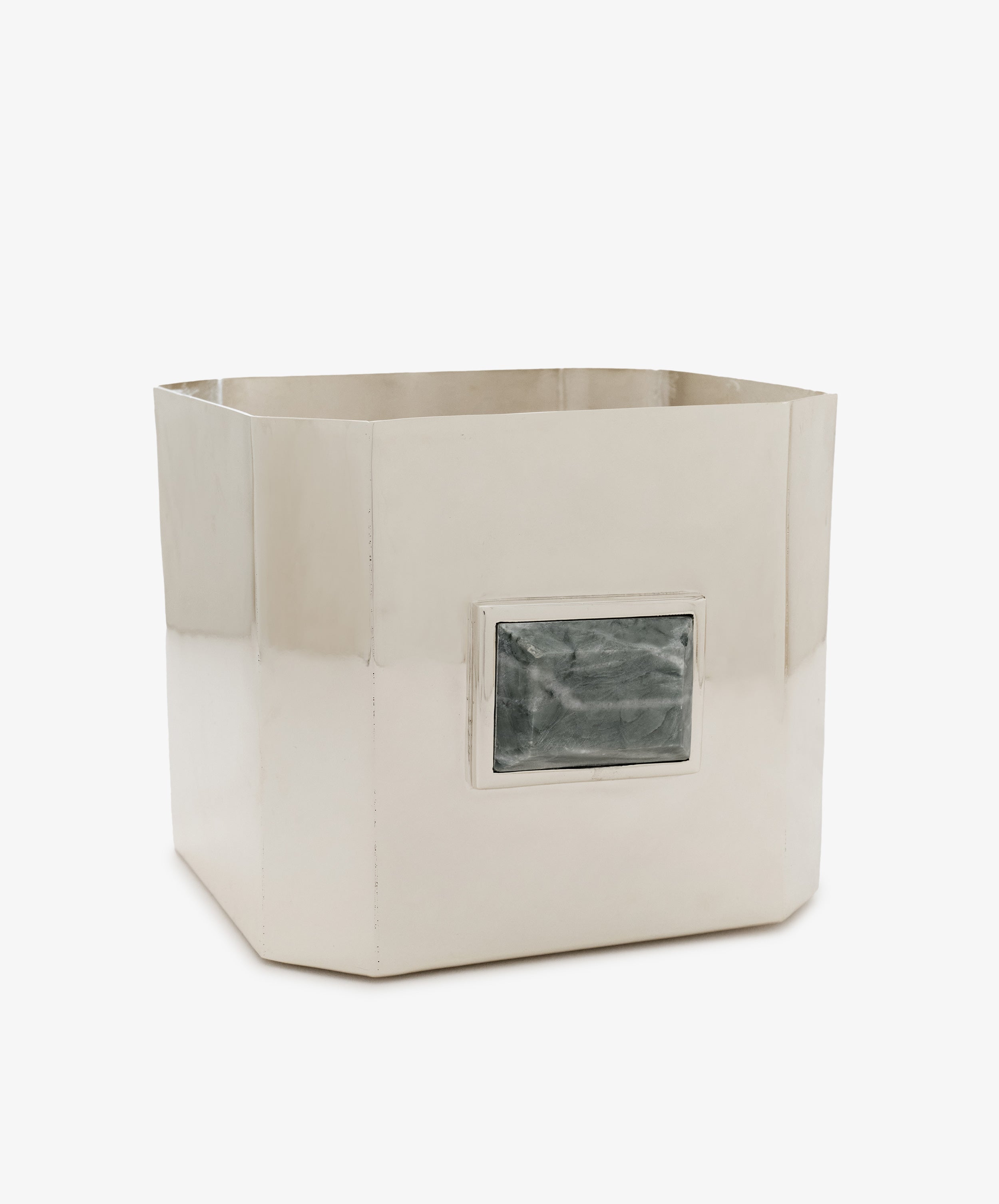 Paros Square Vase—a silver-colored metal container with a shiny finish and a rectangular, marbled green stone accent on one side, evoking the style of a Brancusi vase.