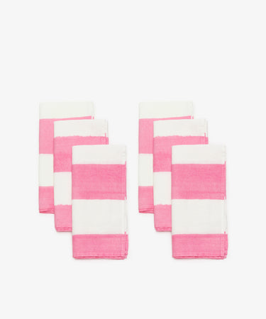 Striped Napkins by Summerill & Bishop. Two rows of three white linen napkin with thick pink stripes.