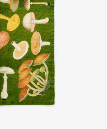 John Derian Fungi Napkin. Set of six napkins with mushroom motif. Close up of corner.