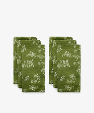 S&B Green Napkins. Set of six green napkins with floral pattern. Front view.