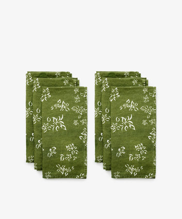 S&B Green Napkins. Set of six green napkins with floral pattern. Front view.